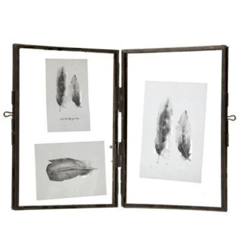 This Hinged Iron Glass Photo Frame by Heaven Sends is a lovely gift for anyone. The frame is simply an iron style frame with a hinge in the middle and the photos float in between 2 sheets of glass. Each side has a hanging loop so this iron and glass frame